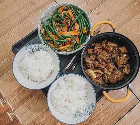 Various cooked food items placed on a tray | Woodstock Resorts, Coorg