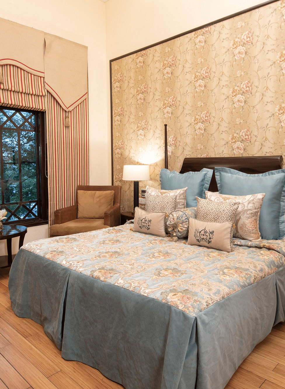 view of the king sized bed in a duplex family suite at the Claridges Nabha Residence, Mussoorie