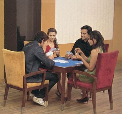 A dining seating arrangement with people having food at Nirvana Luxury Hotel, Ludhiana.