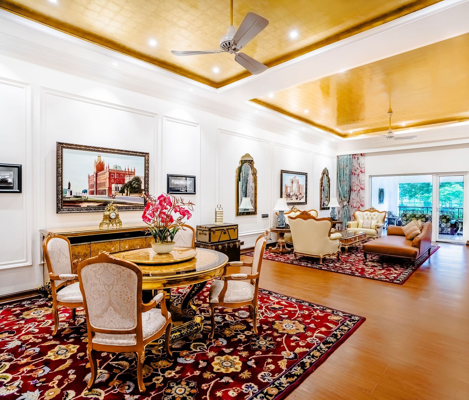 a sofa set and a dining table in the living room - Mayfair Tea Resort, Siliguri 