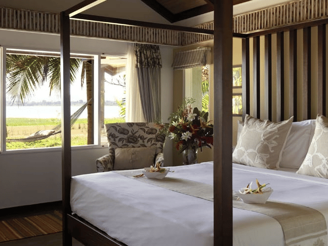 bedroom in the Waterfront Villa at The Serai Kabini