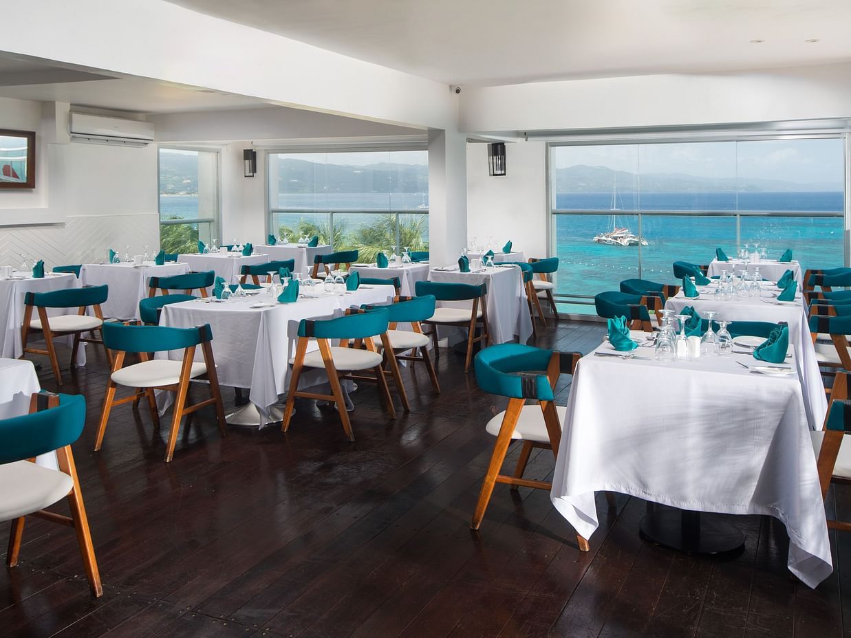 An image of a restaurant in Jamaica offering views of a crystal clear sea  - S Hotel Montego Bay, Jamaica