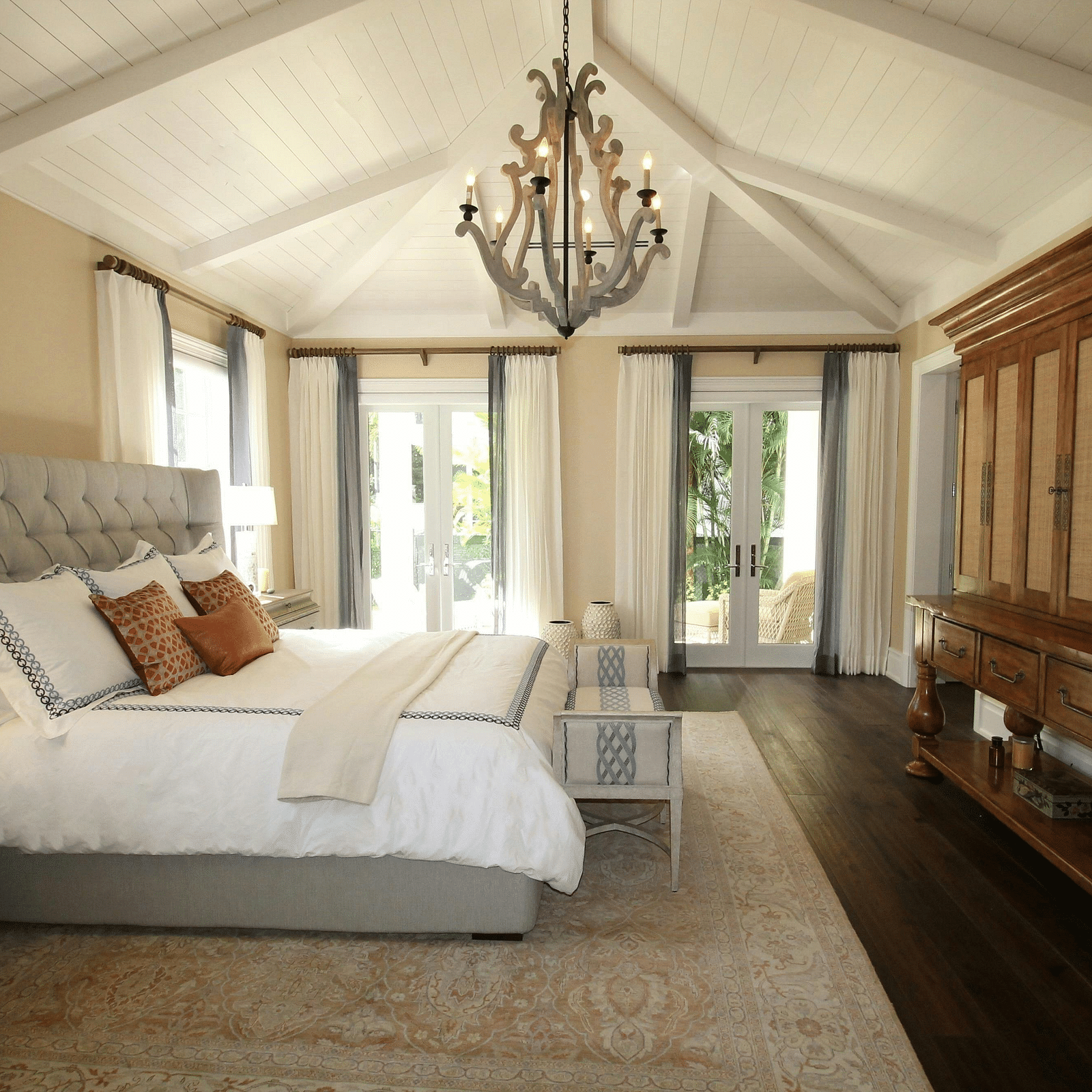 Hotel room with spacious bed and beautiful  chandelier