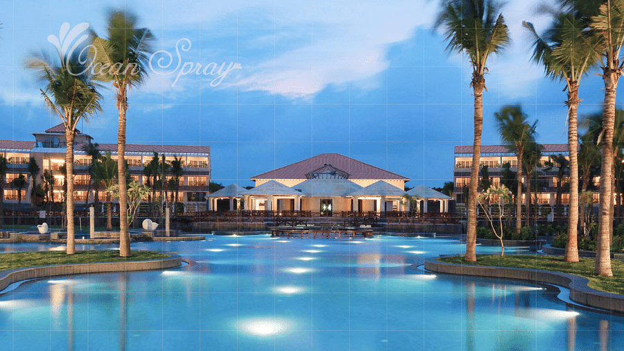 swimming pool surrounded by villa and tree at Ocean Spray, Puducherry.
