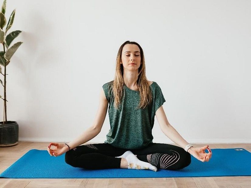a person performing Yoga
