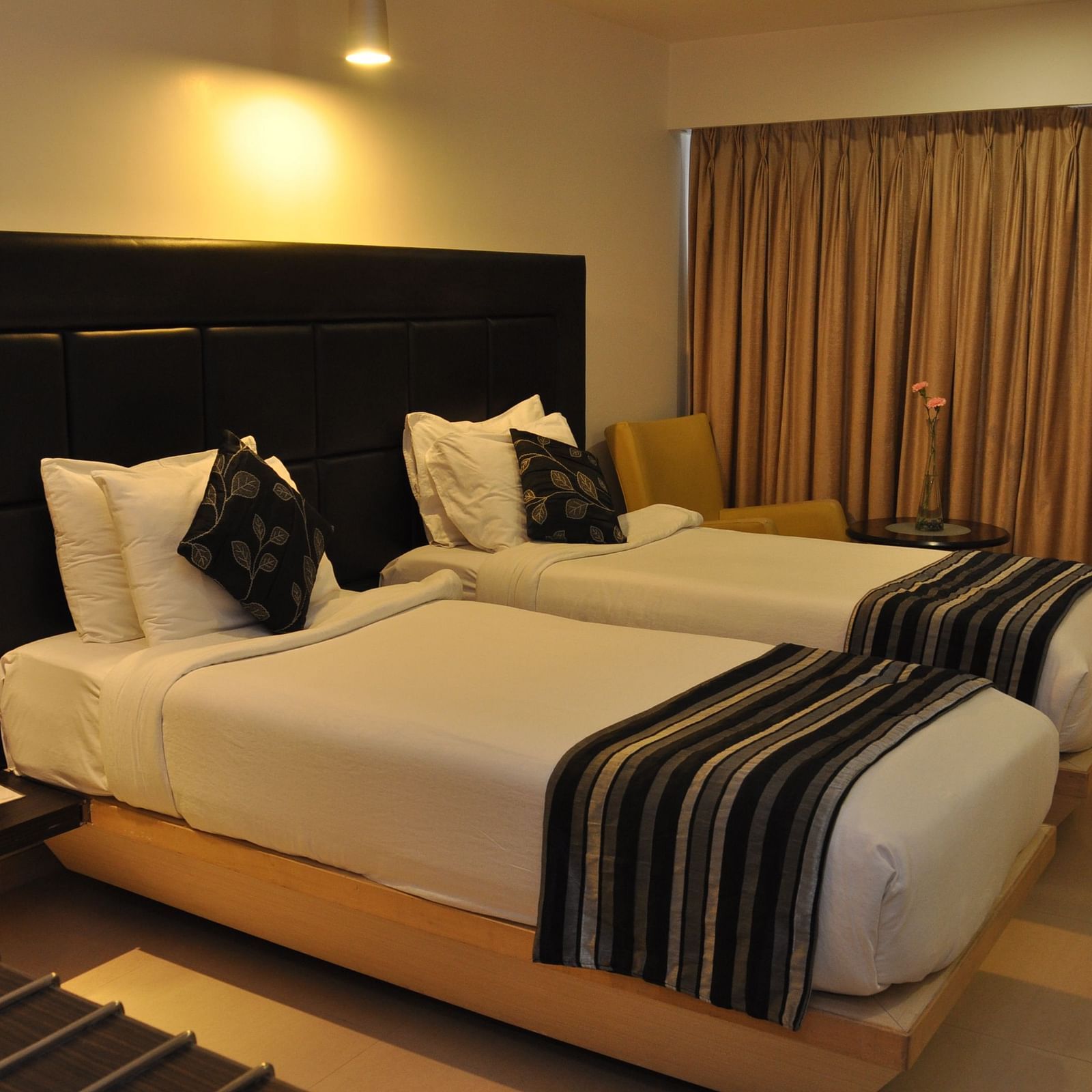 Premiuim Twin Room with twin beds and windows on the side at at The Oriental Residency