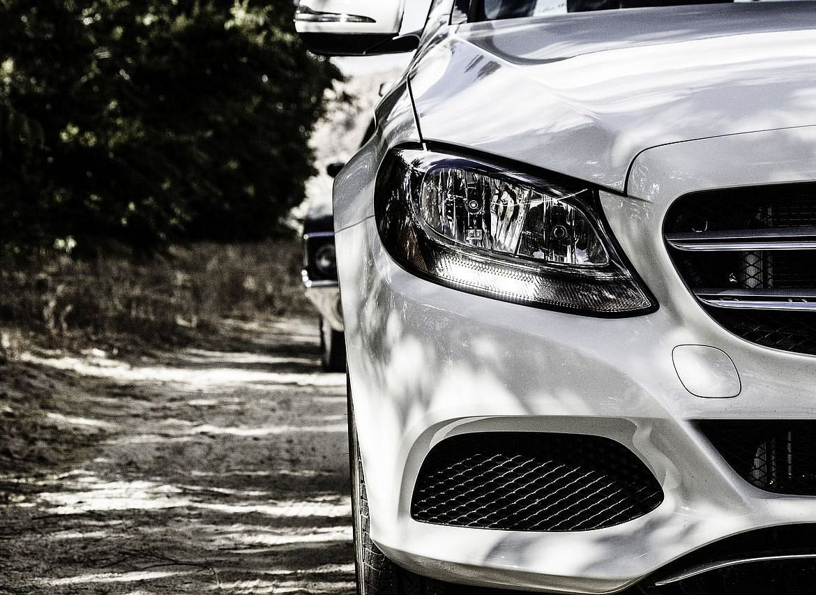A close-up view of the car's front headlight