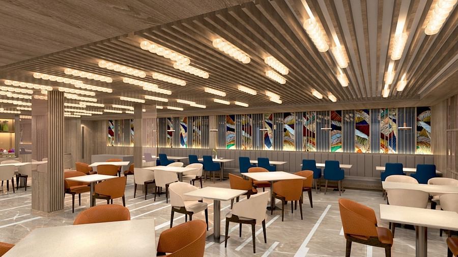 seating arrangements inside the restaurant 1 at Golden Tulip Bhopal