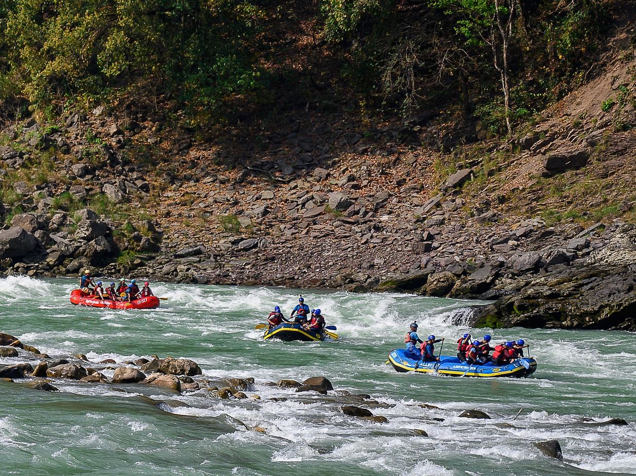 a Group of people River Rafting