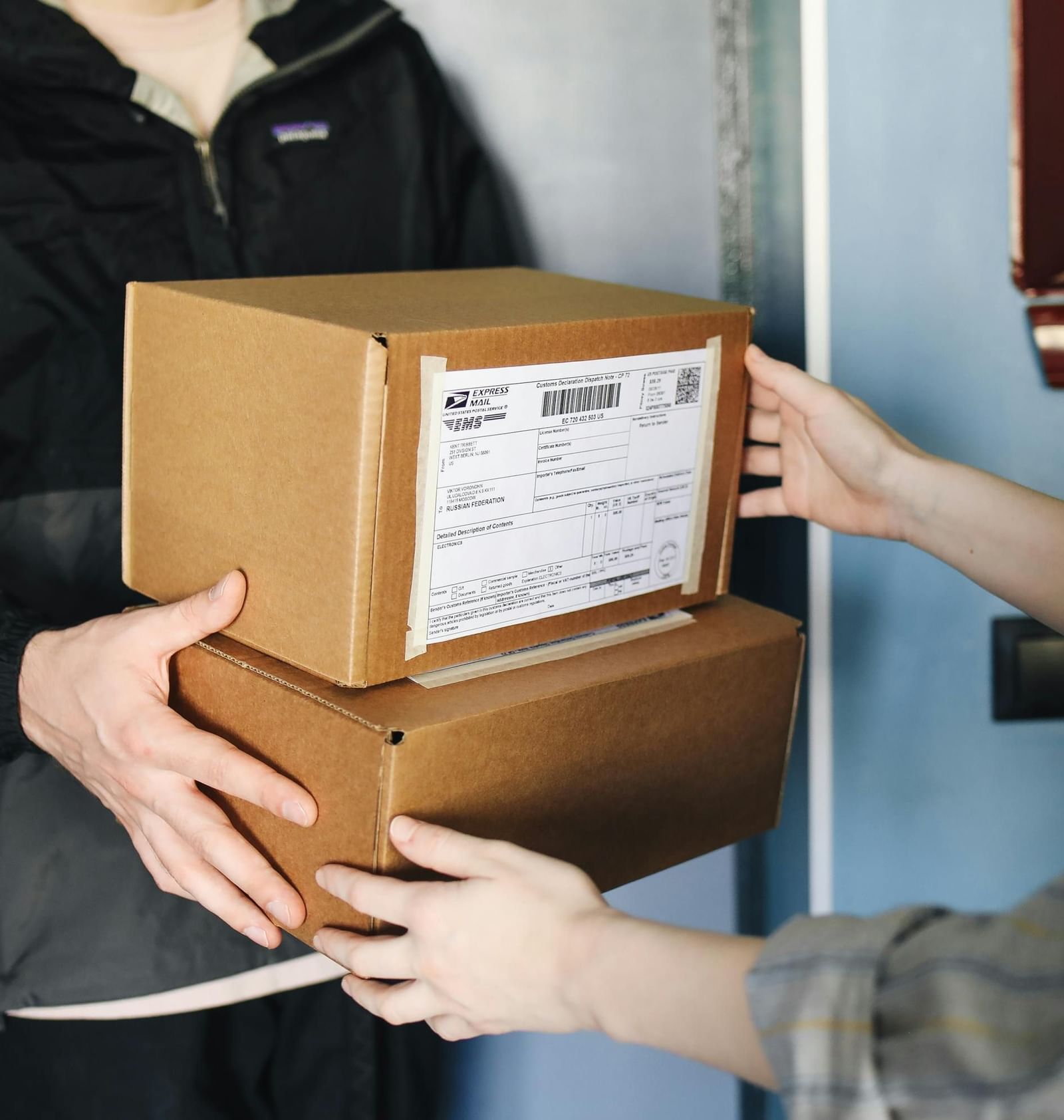 A delivery package being handed over safely.