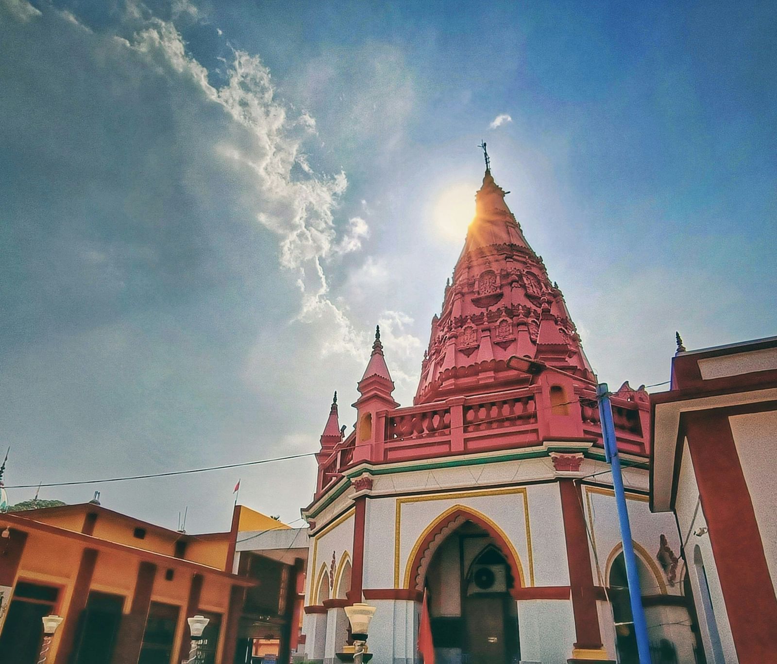 A low angle view of a tower at the Jagannath Temple, Agartala, seen during a sunset.