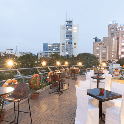 seating arrangements on the the open air deck at Polo Floatel Kolkata