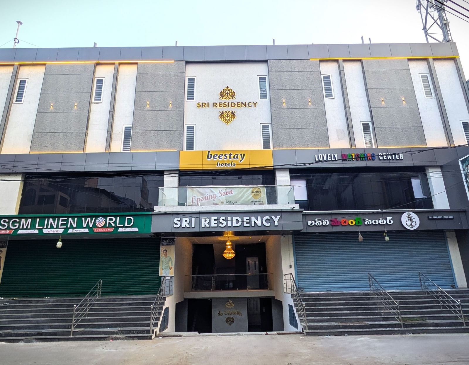 Exterior front view of Beestay Hotels with clear signage at Beestay Hotels, Rajahmundry.
