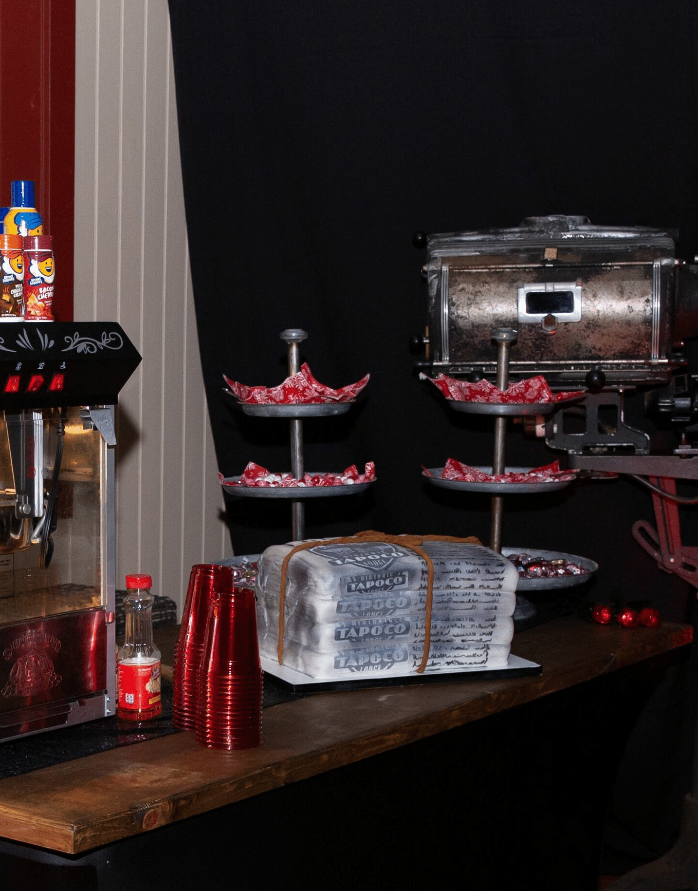 a counter well stocked with refreshing and aerated beverages at the Tin Can Theater - Historic Tapoco Lodge