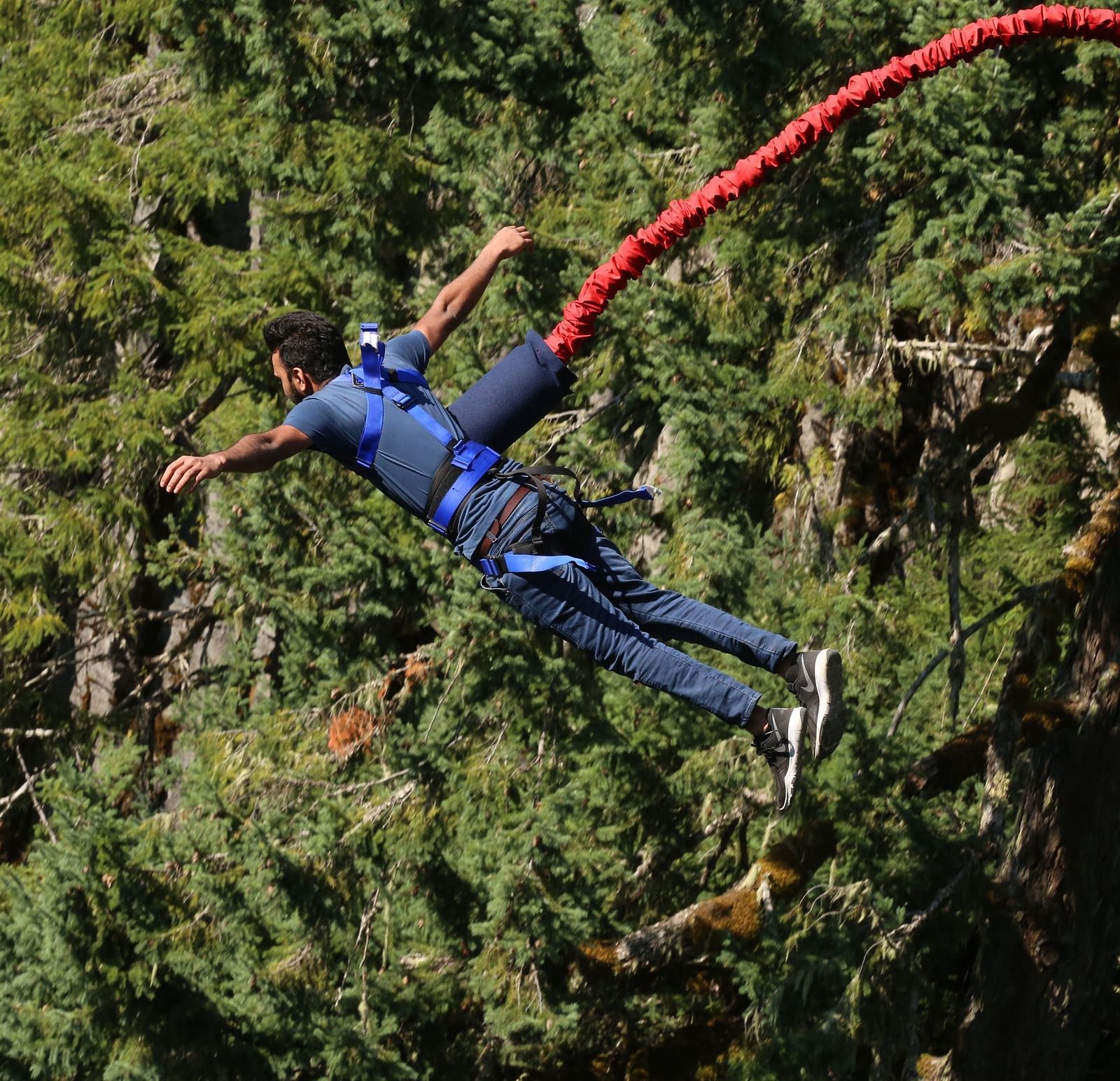 A man participating in bungee jumping