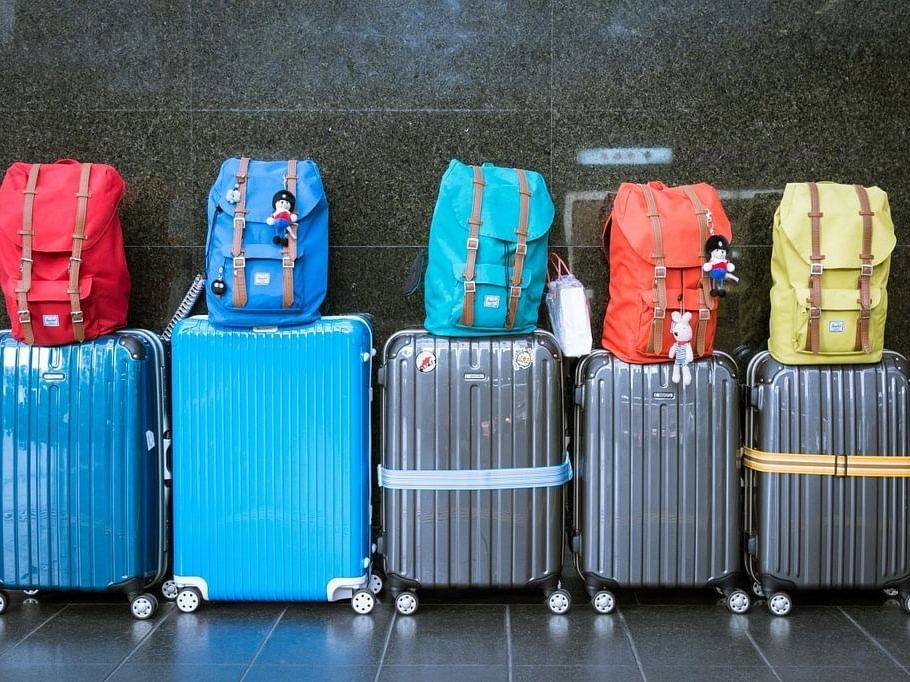 An image showing backpacks and trolleys