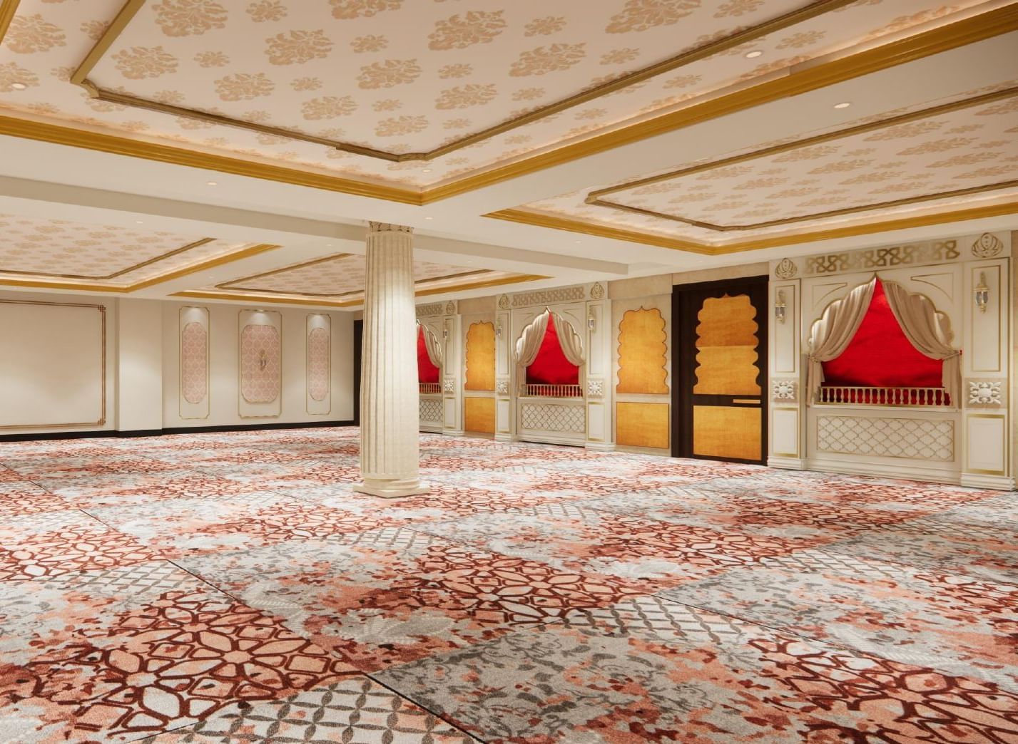 Spacious banquet hall with ornate ceilings, grand pillars, ambient lights, and wallpaper styled after windows in Indian heritage homes