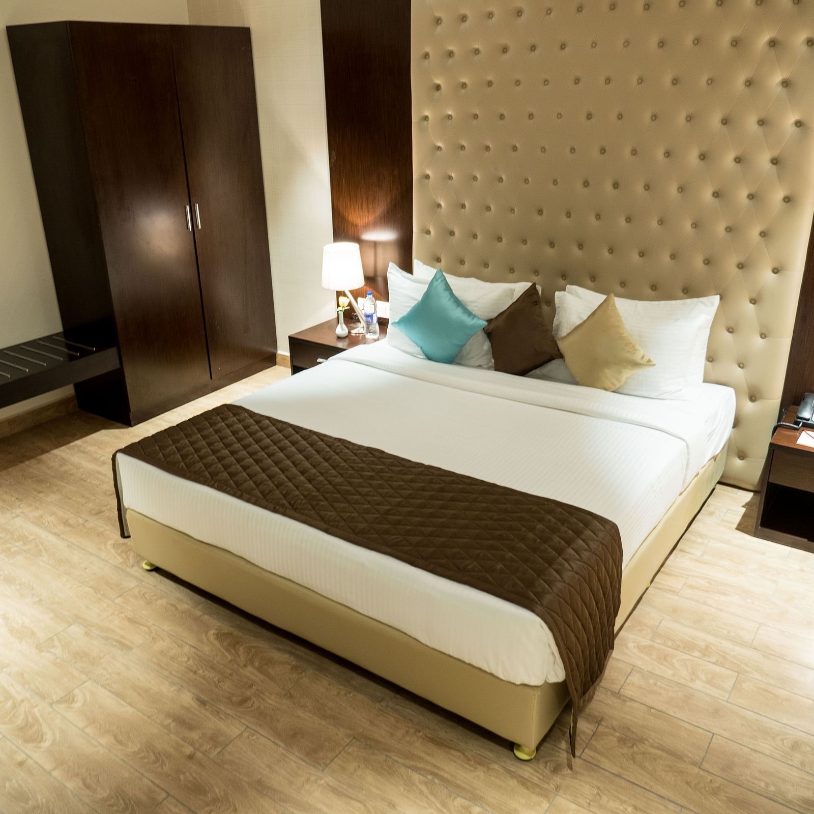 A large bed in Suite at Grand Ashok, Thanjavur.