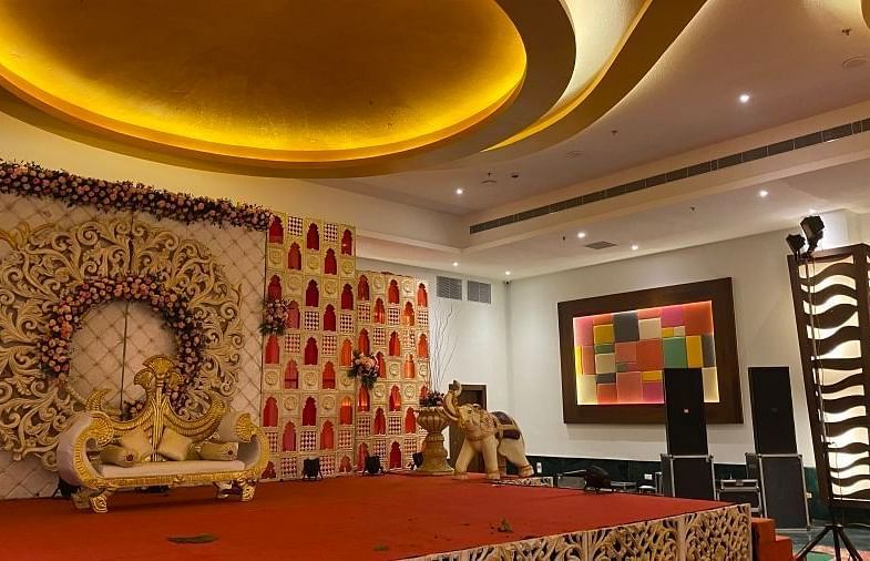 A stage with a decorative backdrop at Bamboo Saa Resort & Spa, Udaipur