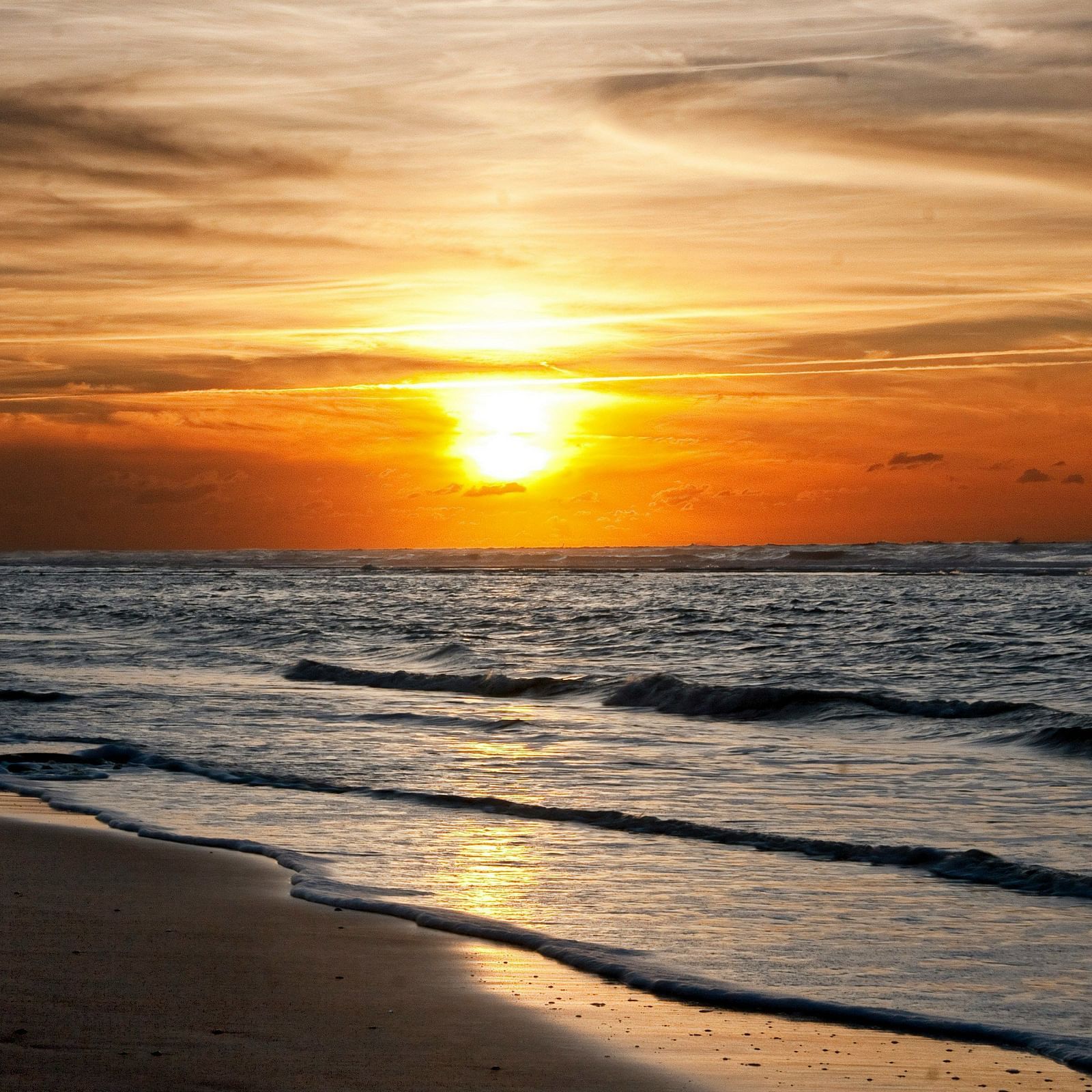 Image of a beach at sunset.