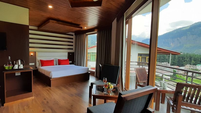 Wide-angle shot of family Suite along with scenic view from the balcony