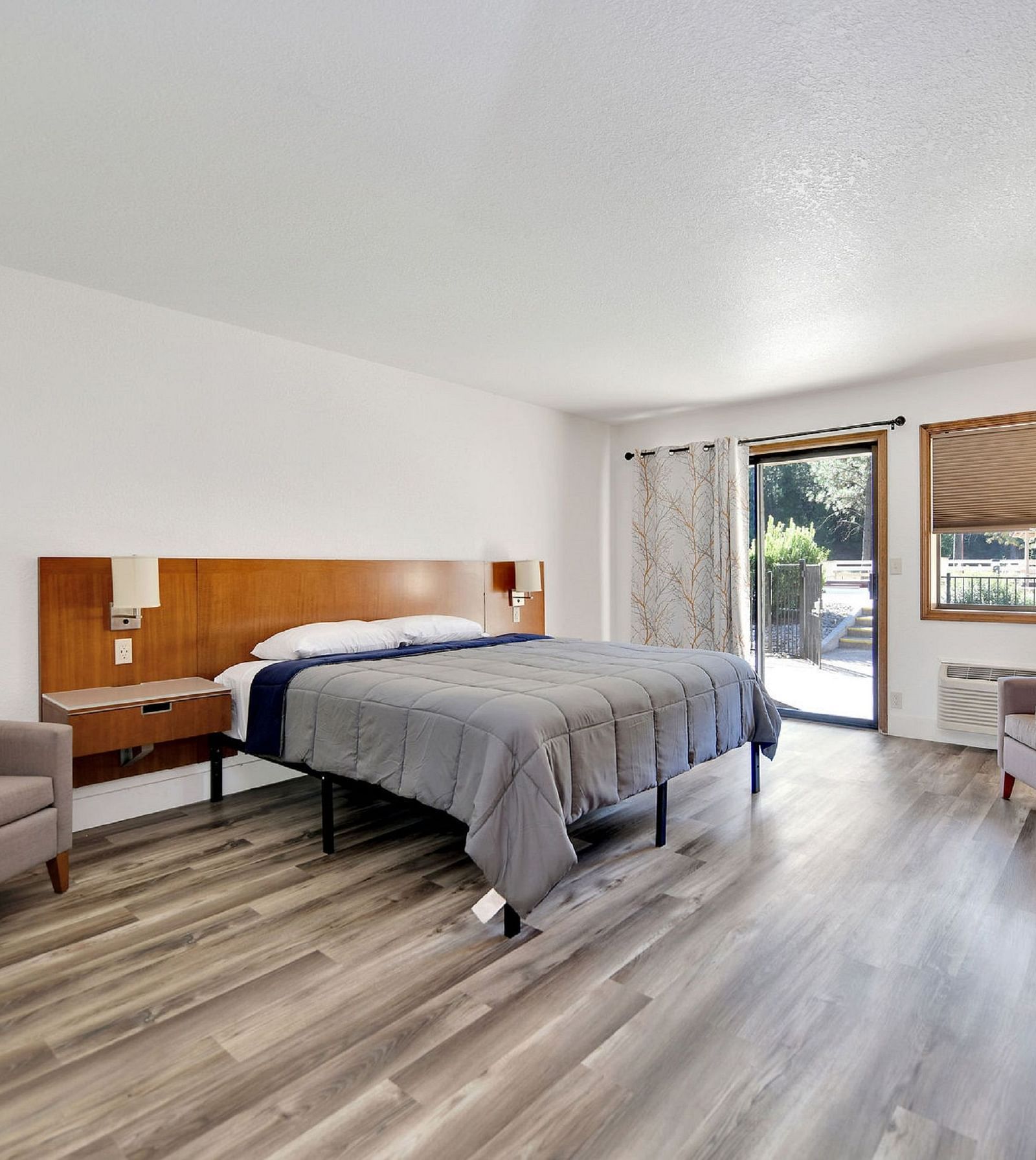 A view of a room at Amador Hotel with a double bed.