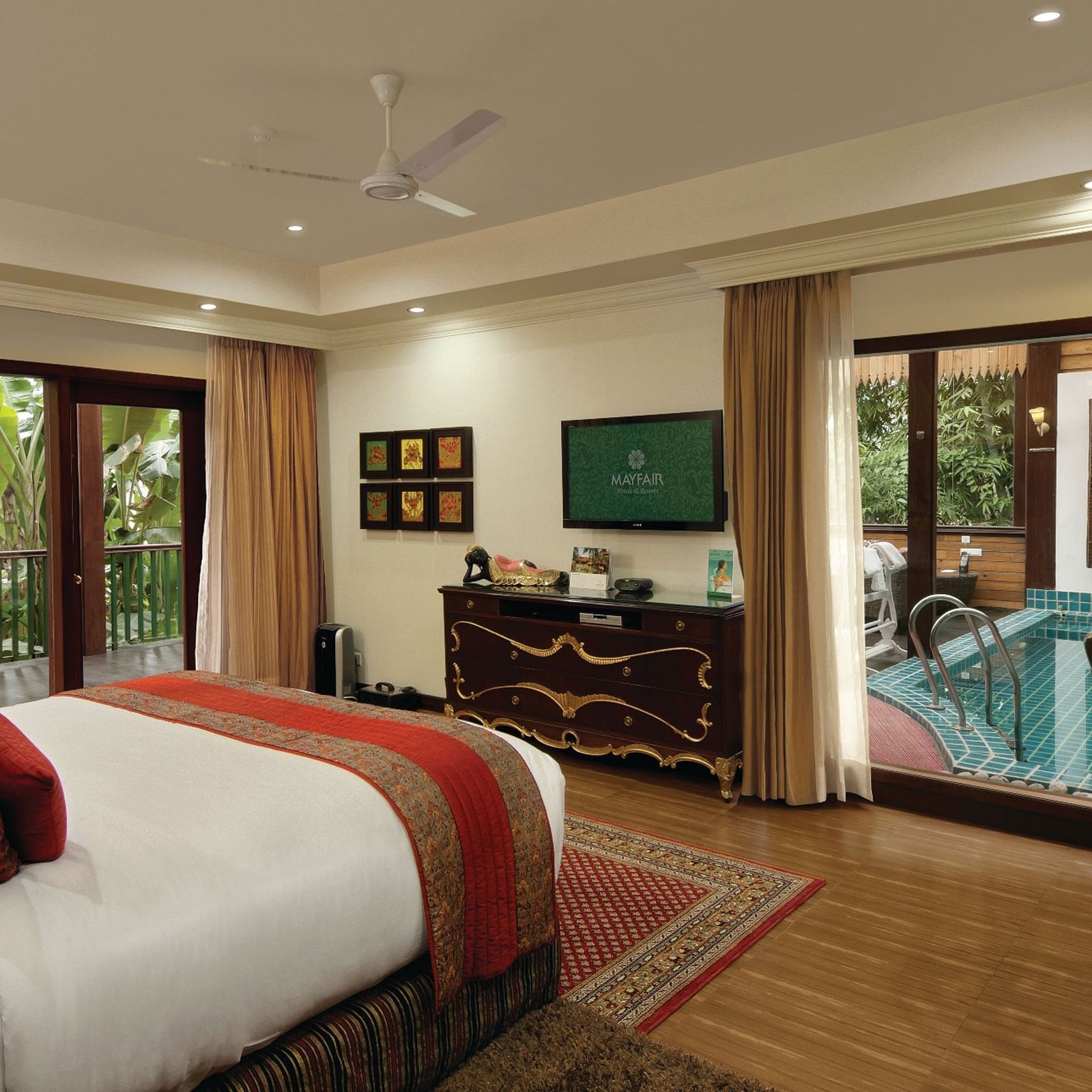 a king size bed overlooking the attached private dip pool - Mayfair Spa Resort & Casino Gangtok 1
