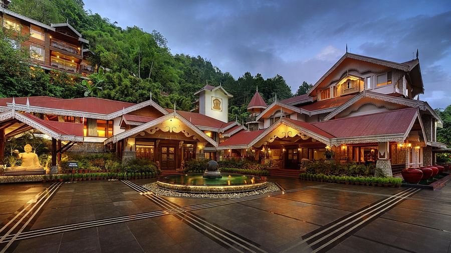 the exterior facade during night time -  Mayfair Spa Resort & Casino Gangtok 