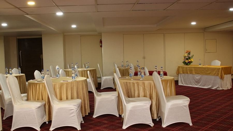 Number of chairs arranged facing right, in a way that it addresses the dais - Monarch Hotels