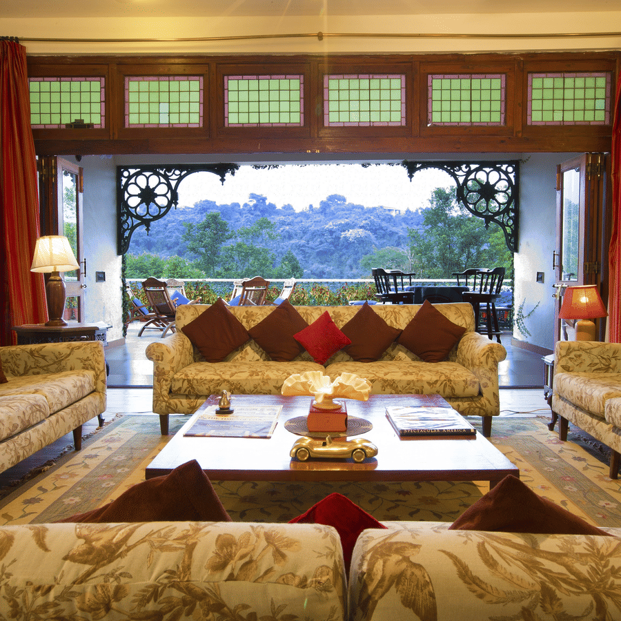 Image of a living room with sofas  royal decor and beautiful views