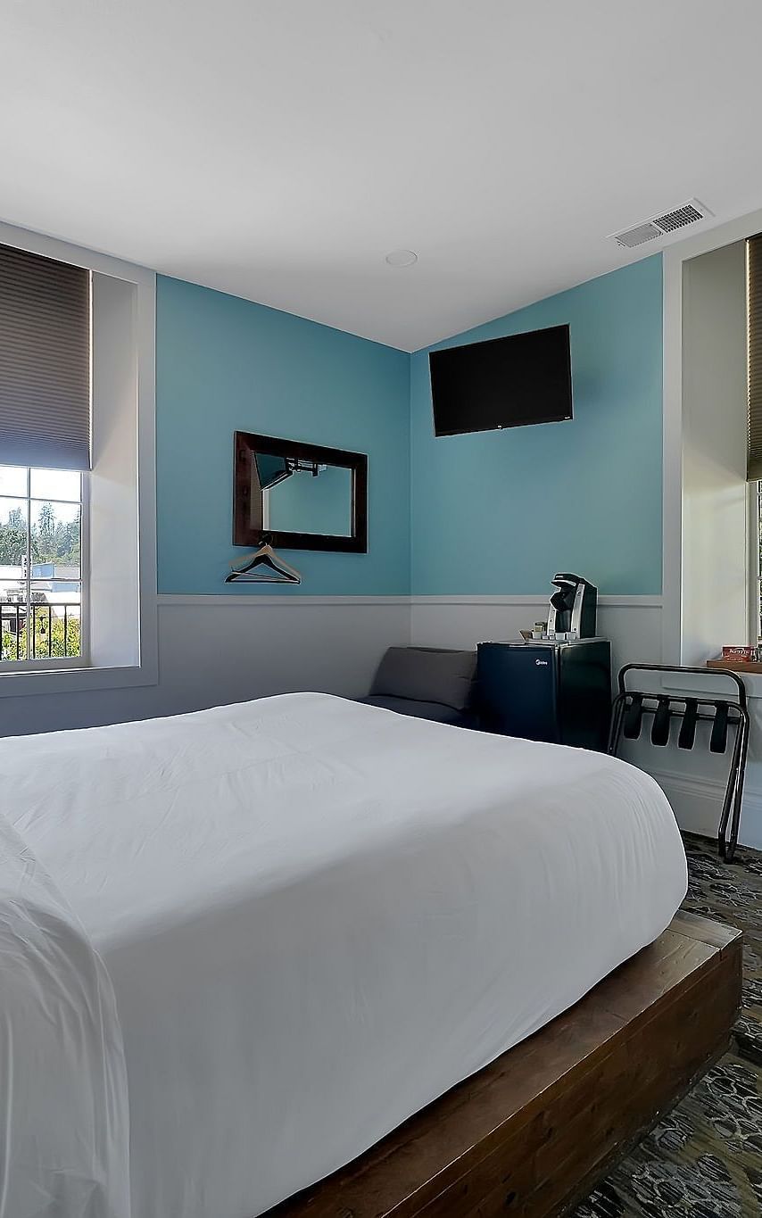 A view of a room at The Groveland Hotel with a double bed.