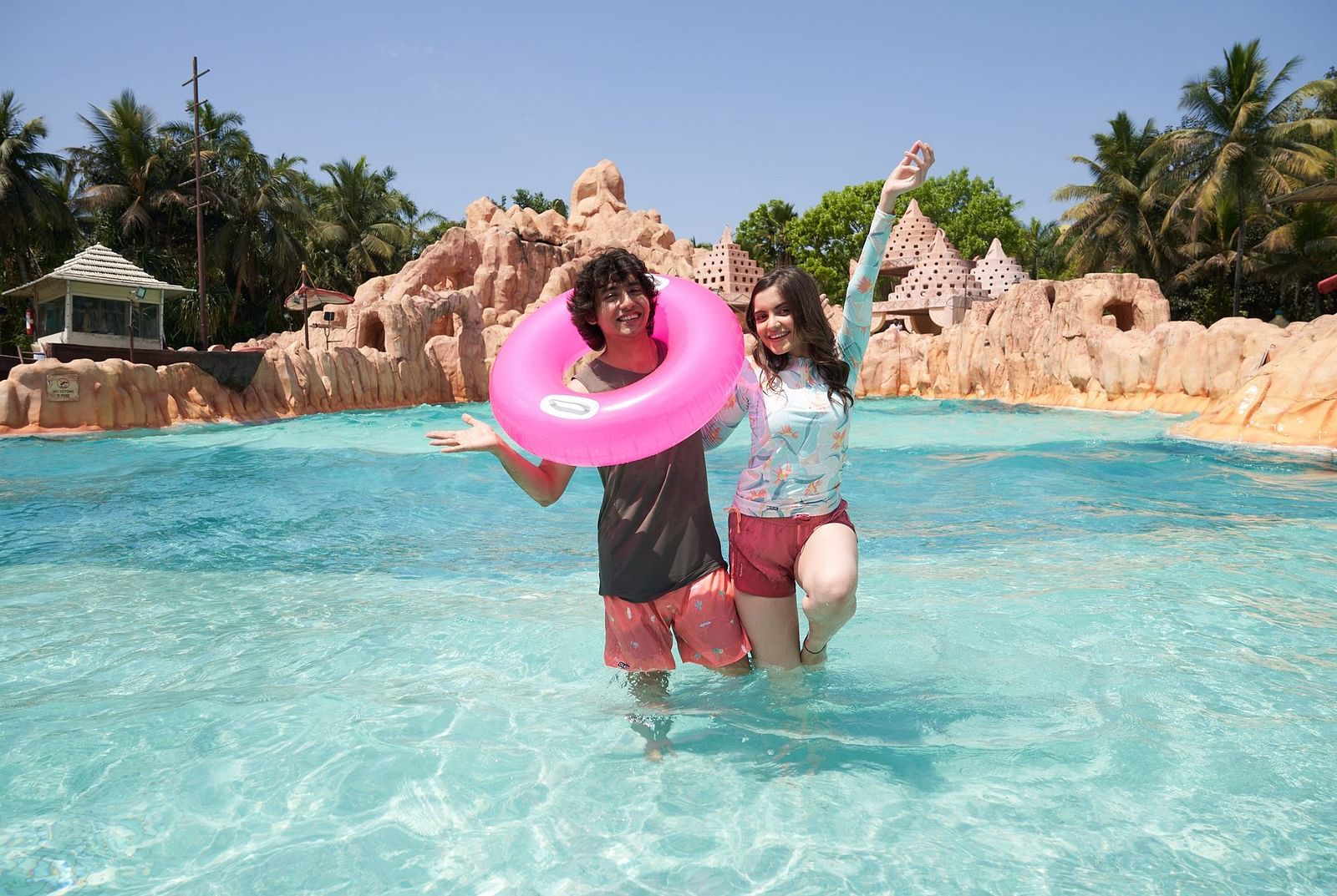 An image of a man and a woman enjoying themselves at the Wetlantic wave pool - Water Kingdom