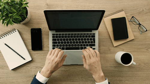 videoblocks-business-man-working-and-writing-in-laptop-on-office-desk-background-hands-top-view-slow-motion-red-epic rdwdrtwl3x thumbnail-full01