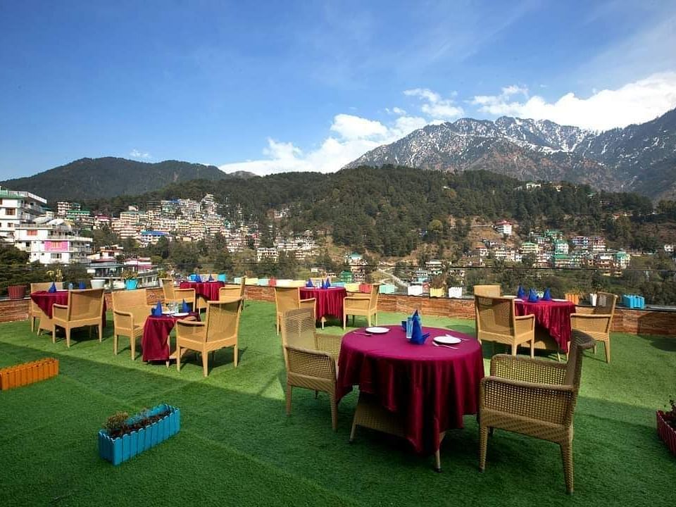 image featuring an open dining space with beautiful views of the mountain - ZENQ SIGNATURE INN, MCLEODGANJ
