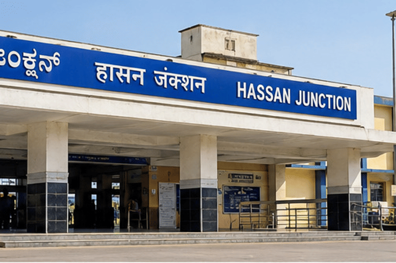 Hassan Junction railway station entrance with its blue Kannada, Hindi, and English name board