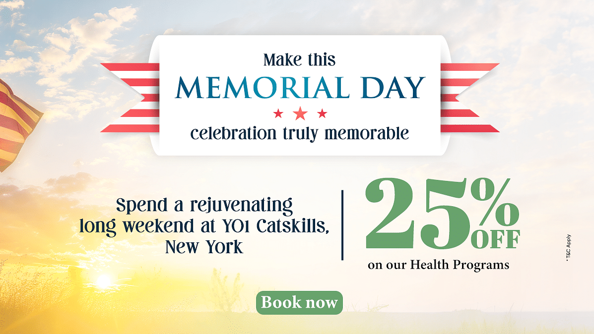 A soldier standing in front of the US flag as the sun is rising from the horizon as the text says - Make this Memorial Day celebration truly memorable. 25% off on our health programs at YO1 Longevity & Health Resorts