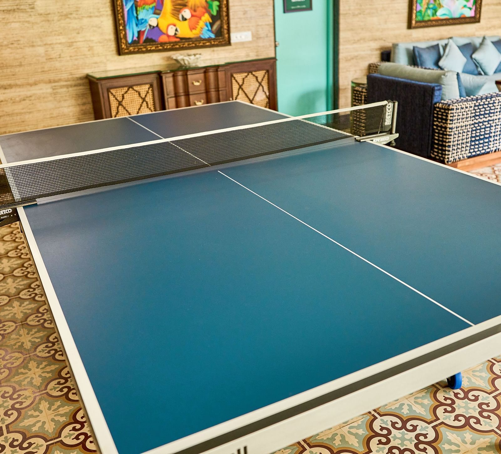 The table tennis table is neatly arranged at Mayfair Manor, Alibag