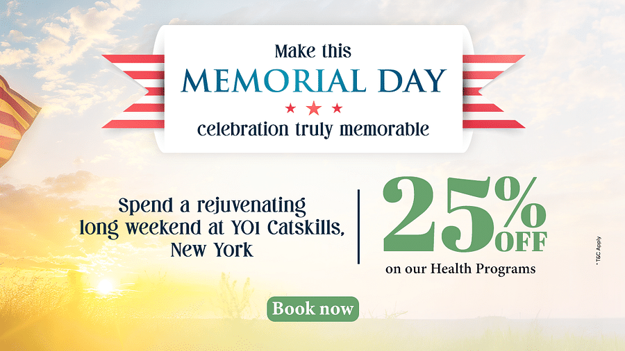 A soldier standing in front of the US flag as the sun is rising from the horizon as the text says - Make this Memorial Day celebration truly memorable. 25% off on our health programs at YO1 Longevity & Health Resorts