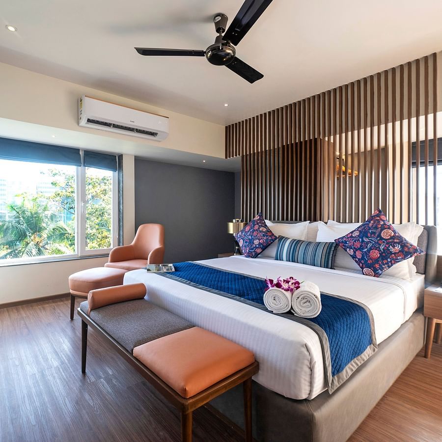 Image of studio suite showing bed and sofa