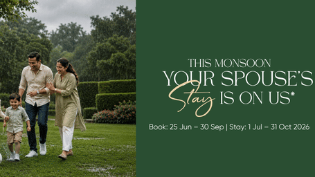 Family enjoying a monsoon day outdoors with a promotional message for a complimentary spouse stay from 1 July to 31 October 2026.