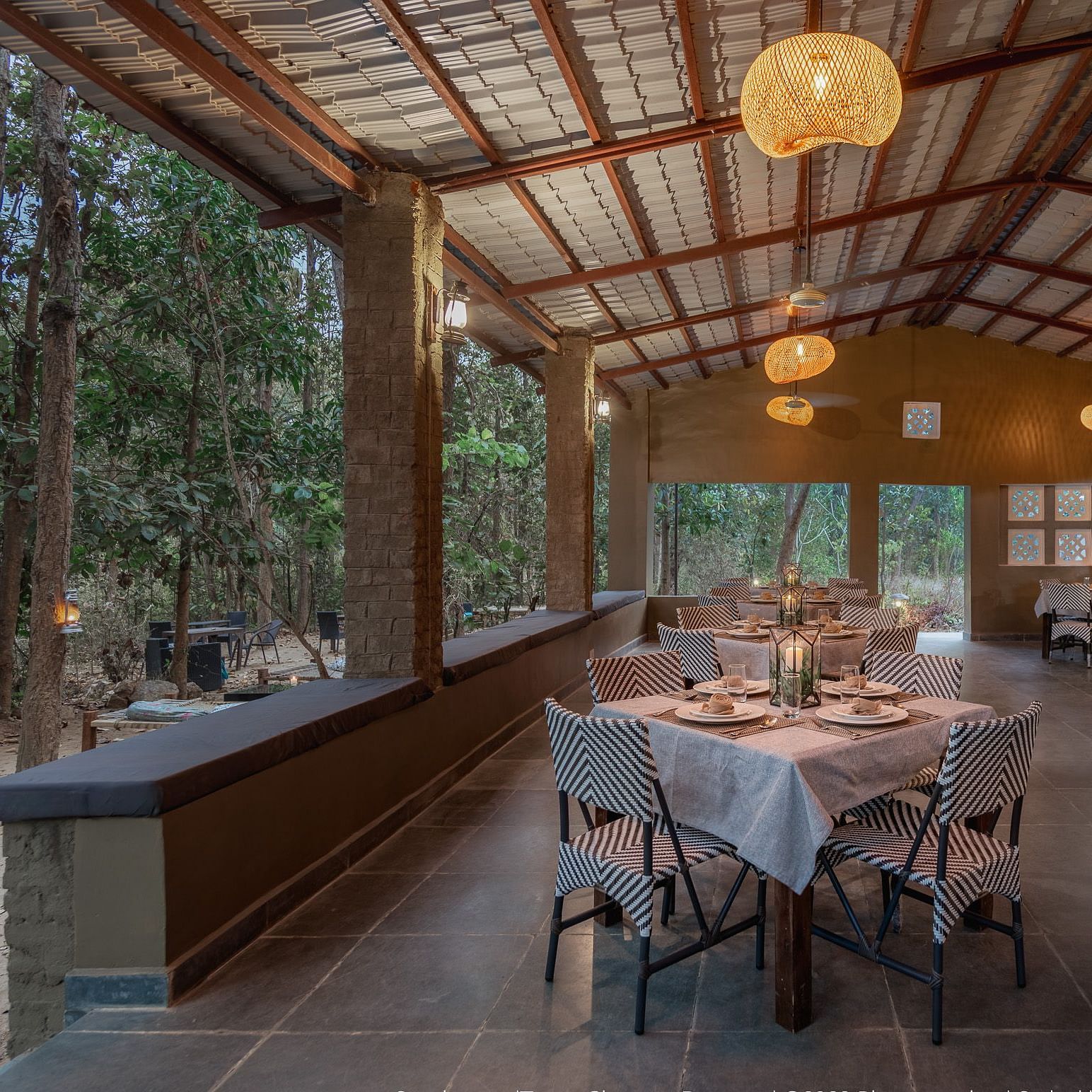 Dining setup at Saccharum Safari Lodge, Balaghat