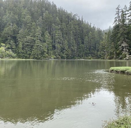 An image of a lake with mountains around
