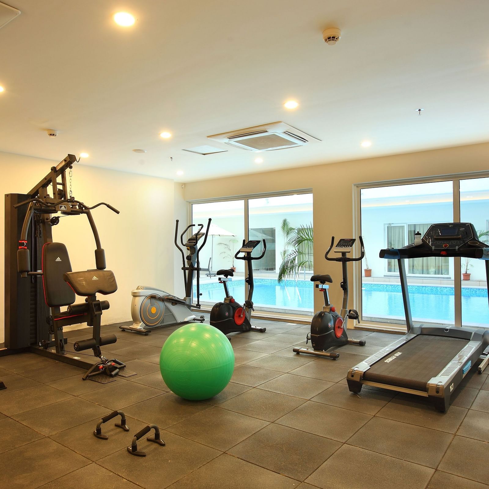 Overview of the Gymnasium with eqipment in view - Starlit Suites, Kochi