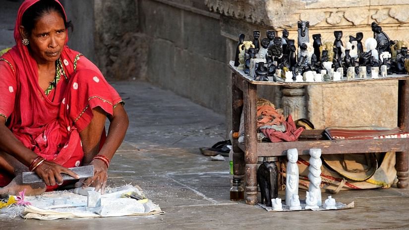 A lady selling handicrafts on thne street