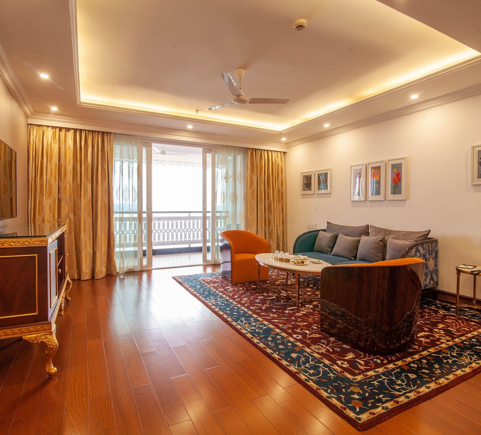 seating space facing the TV in the living room - Mayfair Lake Resort, Raipur