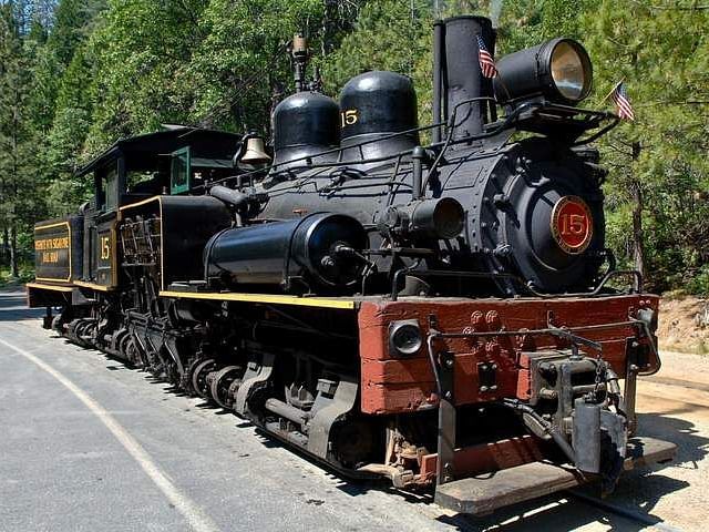 A steam rail engine during the day - Narrow Gauge Inn - A Serenite Hotel Near Fish Camp.