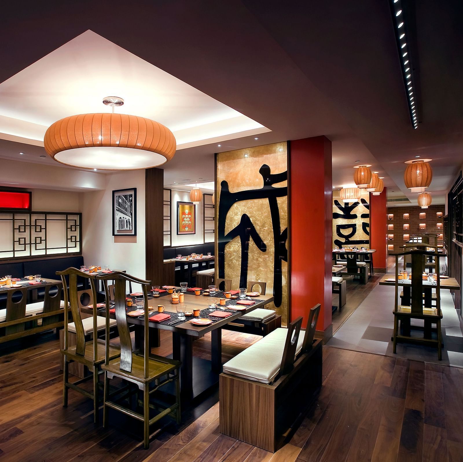 The view shows the interior of a restaurant with chairs and tables.