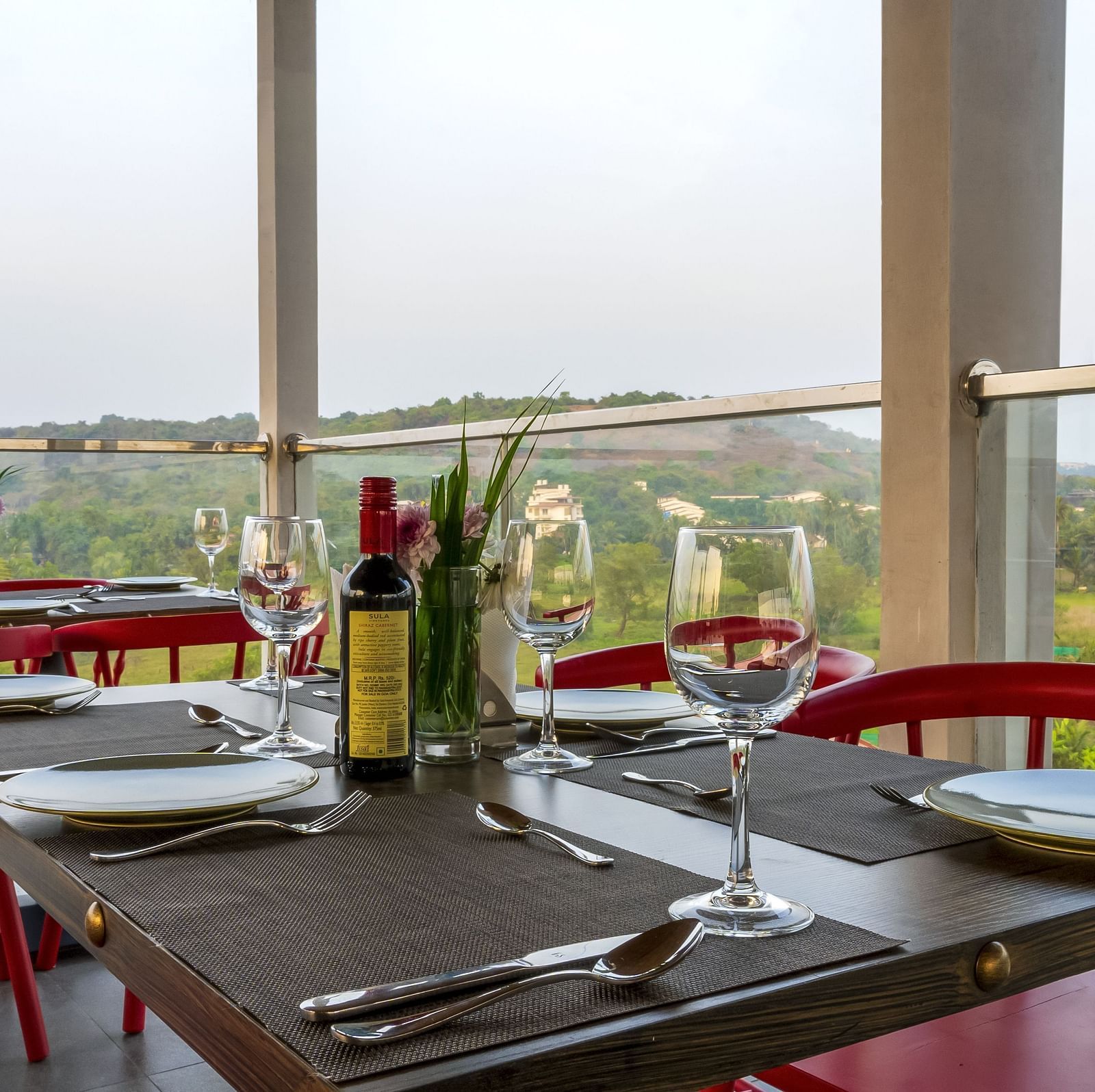 A al fresco seating arrangement inside the in-house restaurant - The Tanisi Hotels & Resorts, Goa