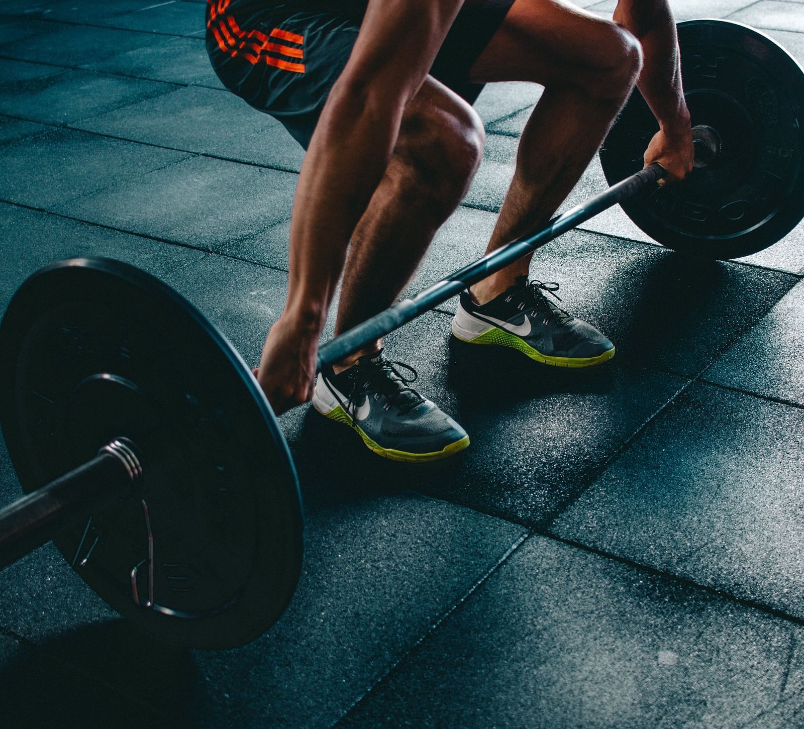 A man lifting weights at the gym