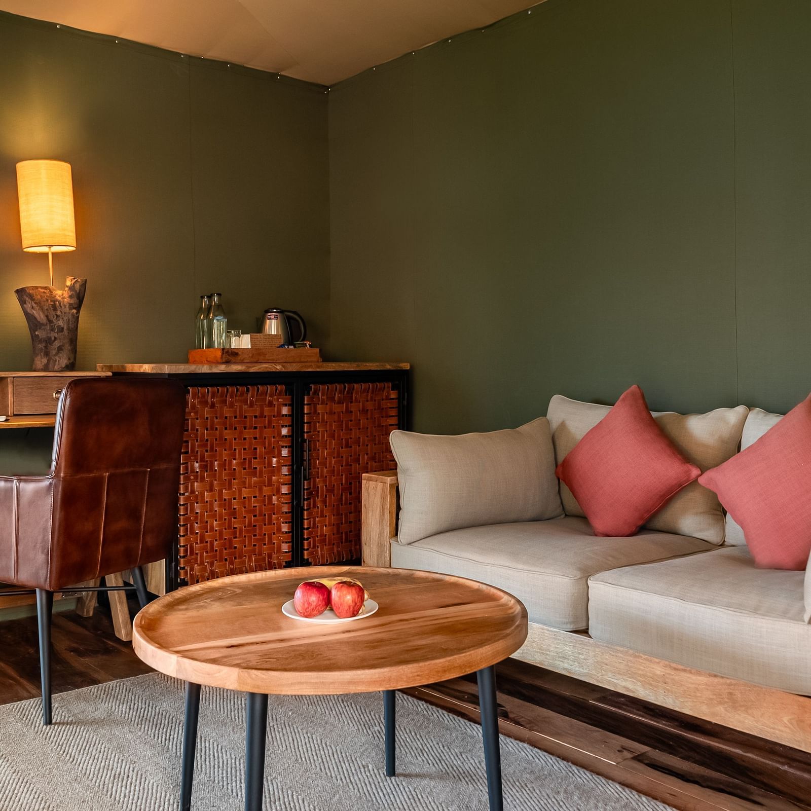 A sofa and a small tea table at Trees N Tigers, Tadoba.